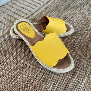 Yellow slip on sandals